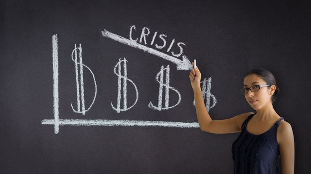 Woman pointing at an Crisis business graph. 