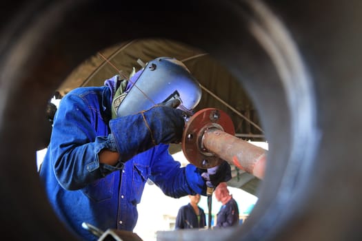 welder at factory work