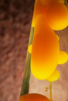 Lava lamp with yellow contents.