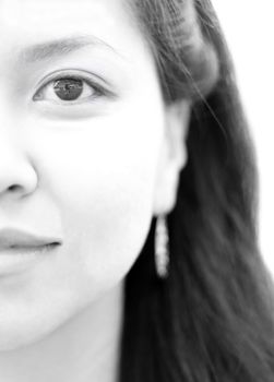 High key tone black and white portrait of a beautiful Thai girl with focus on eye