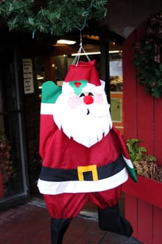 A santa hanging in the window