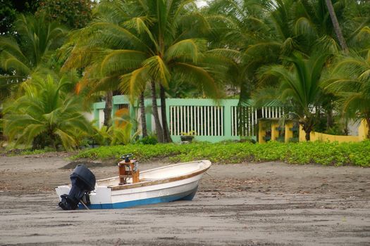 A fishing boat grounded by the low tide.