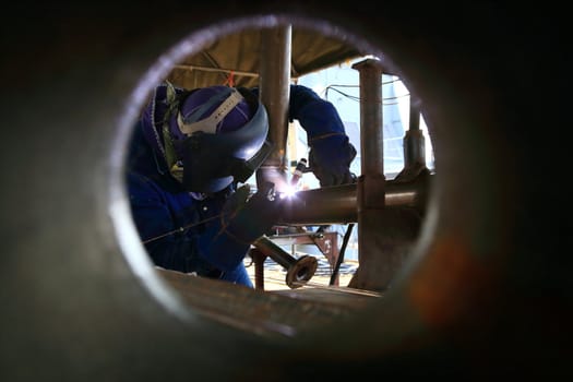 welder at factory work