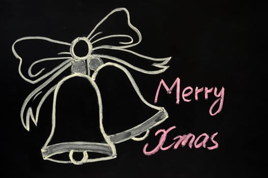 Jingle bells drawn with chalk on a blackboard