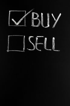 Buy and sell check boxes on a blackboard