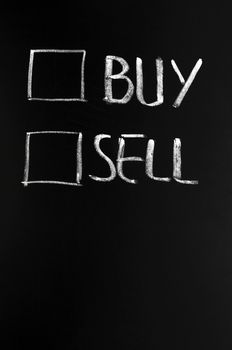 Buy and sell check boxes on a blackboard