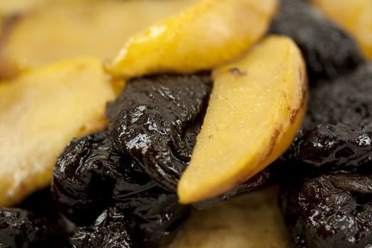 Warm golden delicious baked apples and prunes