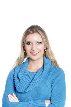 Smiling casual woman with arm crossed in a close up shot