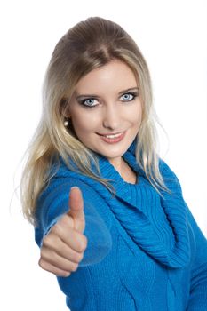 Beautiful young woman in thumbs up gesture