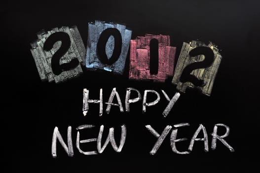 Year 2012 written with chalk on blackboard