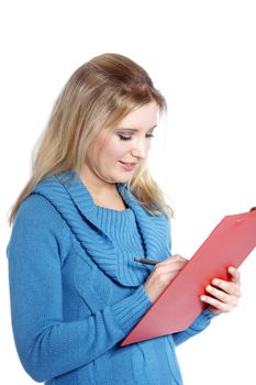Caucasian woman writing on a red folder