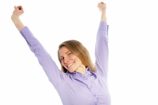 Happy mid age woman raising hands in joy and freedom