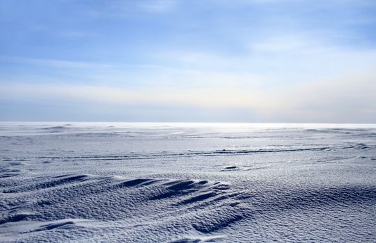 frozen sea looking like white snowy desert