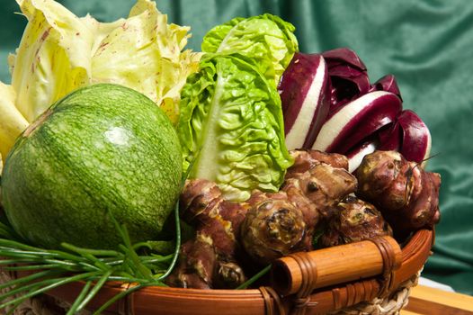 fresh salad on wooden cutting board bamboo