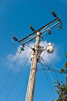 Old light pole with night lighting lamp
