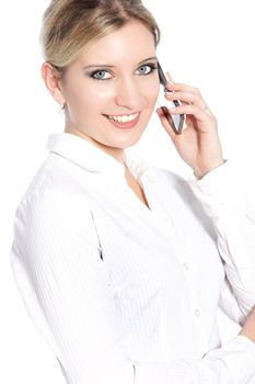 Smiling businesswoman calling using her cellular phone