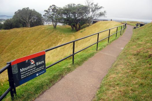 Mountain bikers walking path park sign, Mount Eden, Auckland, New Zealand