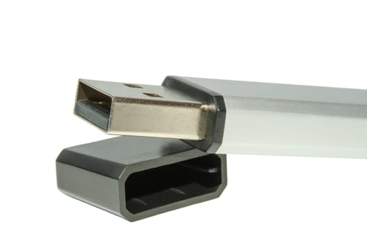 Generic USB flash drive with open cover isolated on white