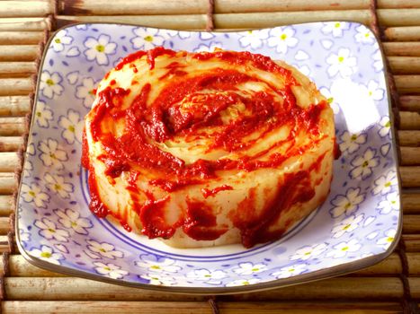 close up of a bowl of korean kimchi