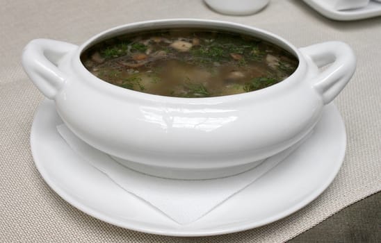 plate of soup on table