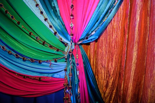 Image of draped Indian fabrics at a wedding