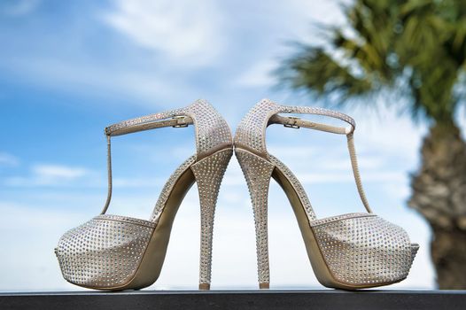 Image of fashionable wedding shoes in outdoor setting