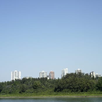 City towers near a river