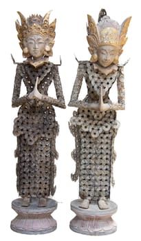 Pair of  Indonesian puppets Indonesian puppet made from metal coins