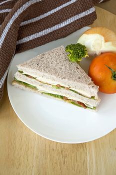 gaba bread sandwich on white plate