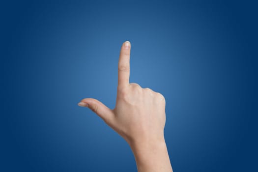 Woman hand on blue background
