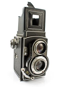 Vintage two lens photo camera isolated on white