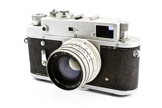 Vintage film photo camera isolated on white