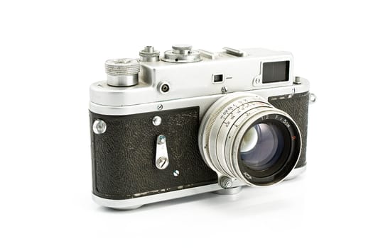 Vintage film photo camera isolated on white