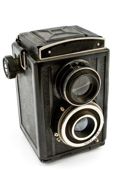 Vintage two lens photo camera isolated on white