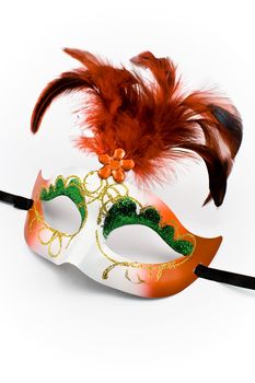 Carnival mask with feathers and diamond isolated on white