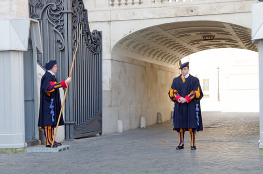 ROME, ITALY - MARCH 11: Papal swiss guard at Vatican Gates on March 11, 2011 in Rome, Italy