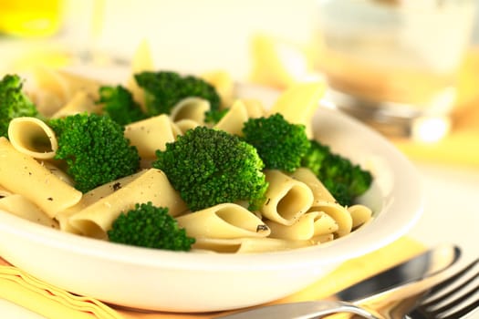 Broccoli with pasta (Selective Focus, Focus on the broccoli in the middle of the image)