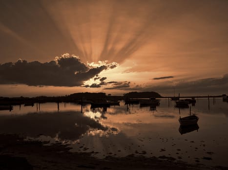 Boats in an amazing seascape of magical sunset - perfect nature boating background digital art manipulation