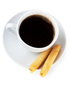 Cup of coffee with roll shaped cookies over white background