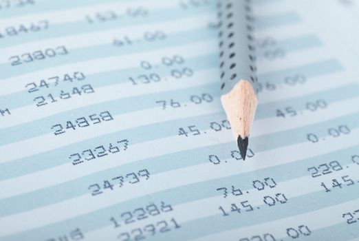 Closeup view of lead pencil on a financial report