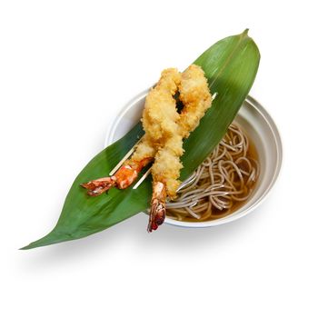 noodles made ​​of buckwheat flour and fried shrimp isolated on white