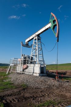 Oil pump on a green field