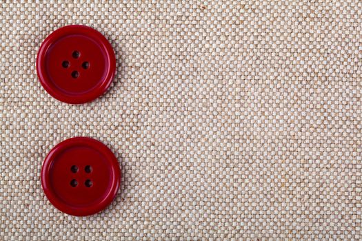 red buttons on the old clothes