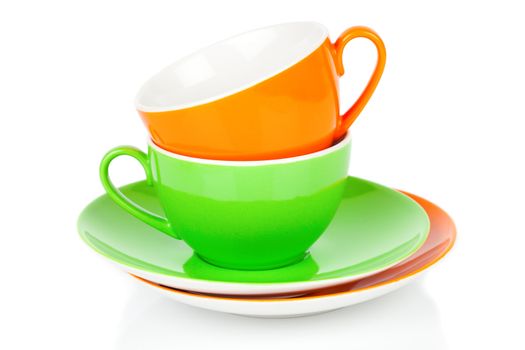 Green and orange tea cup, Isolated on white background