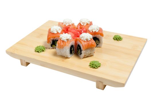 Sushi on wooden stand isolated on white background