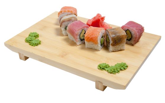 Sushi on wooden stand isolated on white background