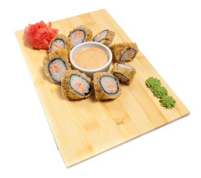 Sushi on wooden stand isolated on white background