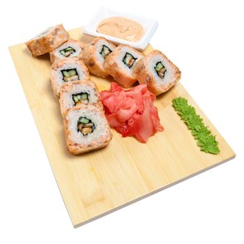 rolled sushi on wooden stand isolated on white background