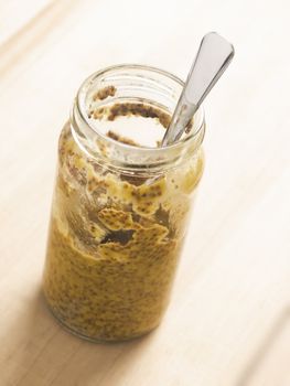 close up of a bottle of multigrain mustard
