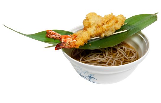 noodles made ​​of buckwheat flour and fried shrimp isolated on white